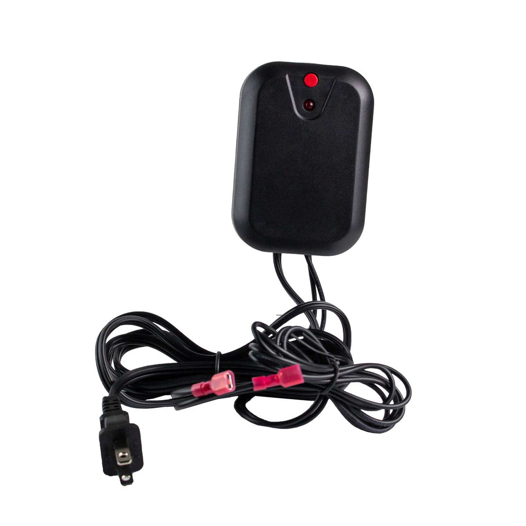 Wireless sensor for fireplace remote with small red indicator and connected power cable.